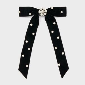 Elegant Black Bow with Pearl Accents